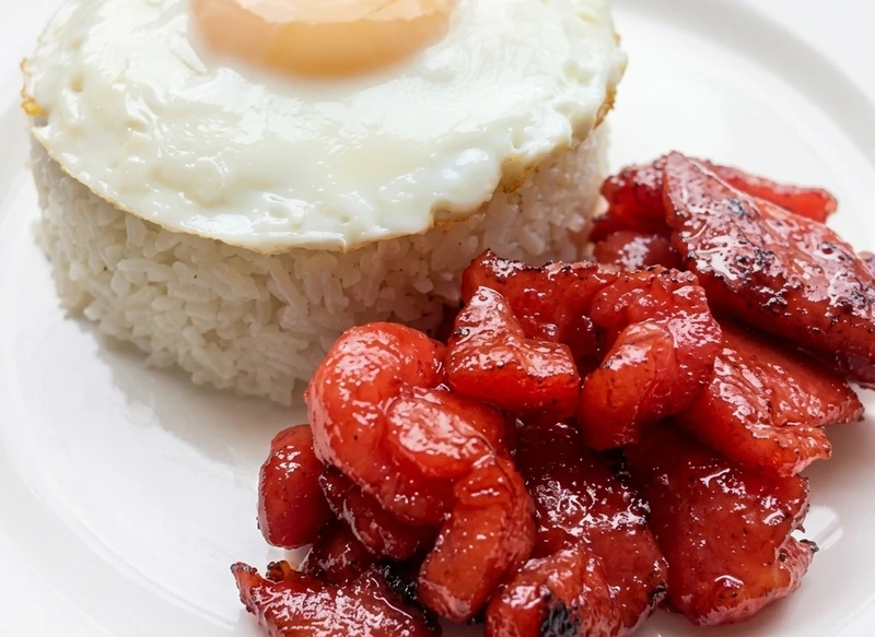 Tocilog with Filipino cured pork tocino, garlic fried rice and egg at Mama Nors Kitchen, Winnipeg